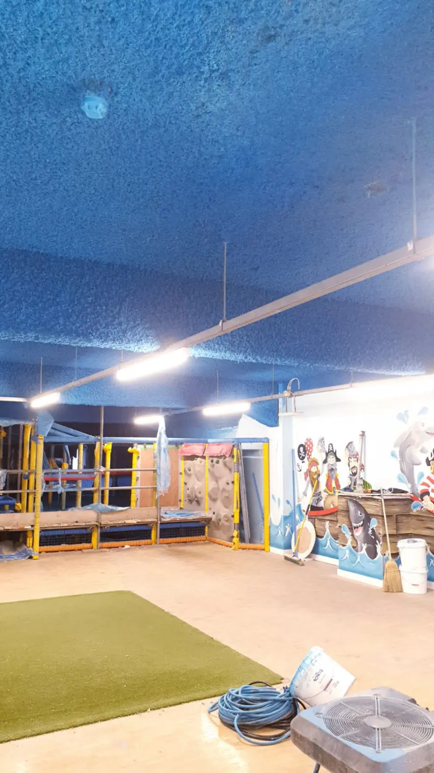 BoSPray acoustic spray in an indoor play area