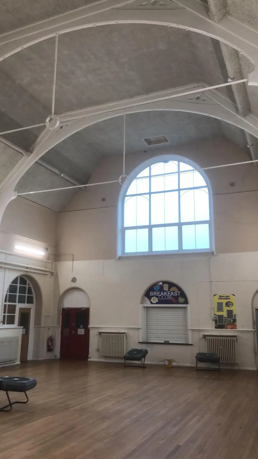 BoSPray acoustic spray in a school hall